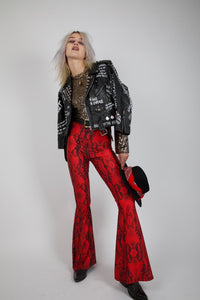 RAISED IN HELL, Red Snakeskin Flares (Unisex)